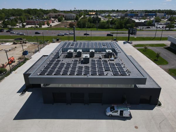 Car Dealership in Normal, IL with commercial solar energy system installed in Normal, IL