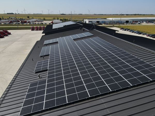 Rooftop commercial solar array installed on commercial business, Nussbaum Transportation