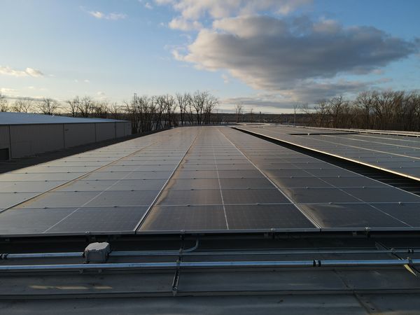 solar panels on the rooftop of industrial solar installation project in East Peoria, IL